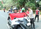 Dorong-Semangat-Nasionalisme,-Kapolres-Bangkalan-Bagi---bagi-Bendera-Merah-Putih